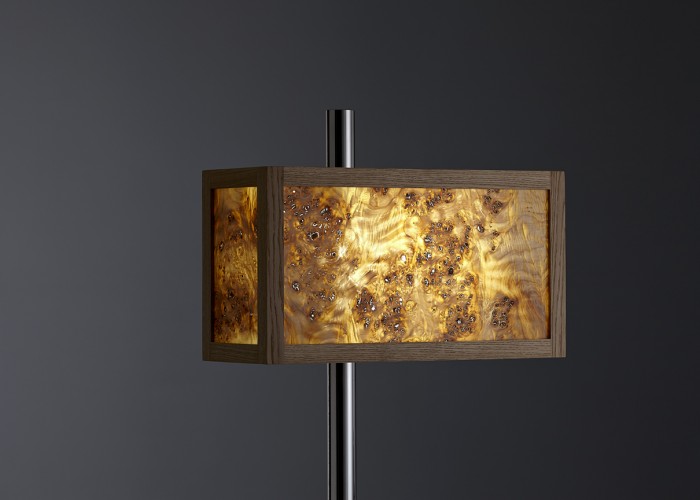 Backlit Burr poplar set in an Oak frame. Mounted on a stainless steel upright. LED lighting.