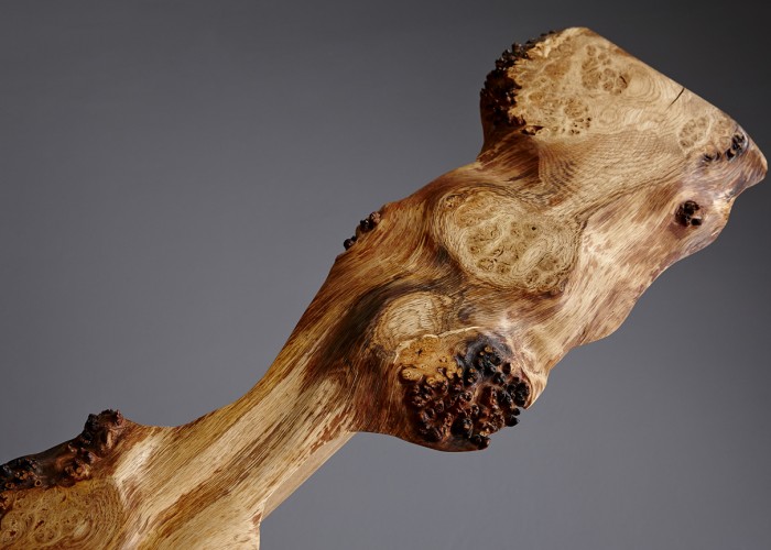 A shot of the second section of the Burr Oak top of the console table.